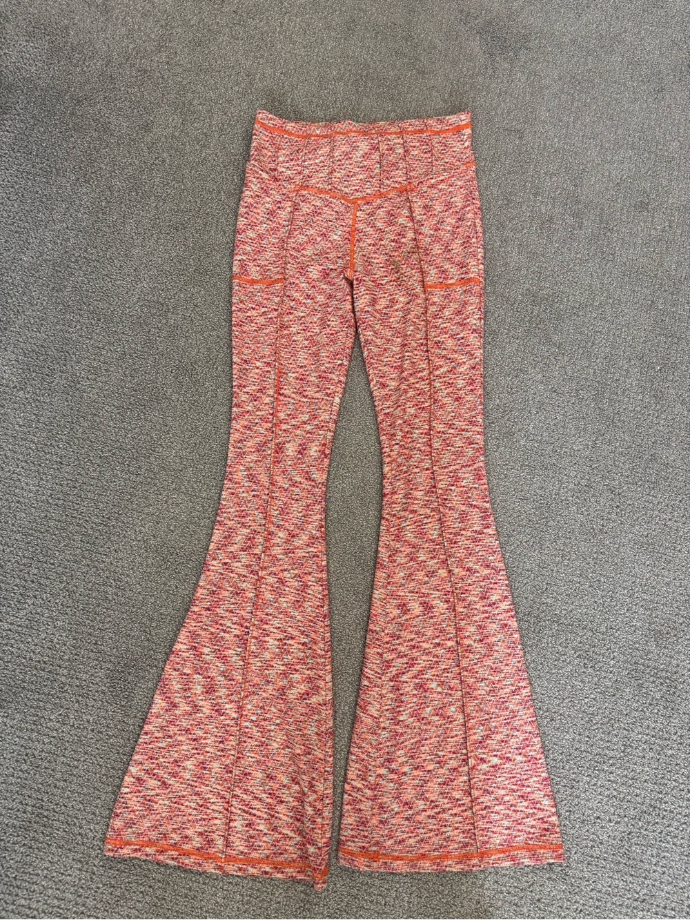 FP Movement by Free People “On-it” Orange Speckled Flare Leggings